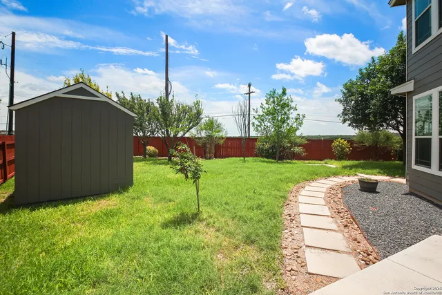 a view of a yard in front of a building