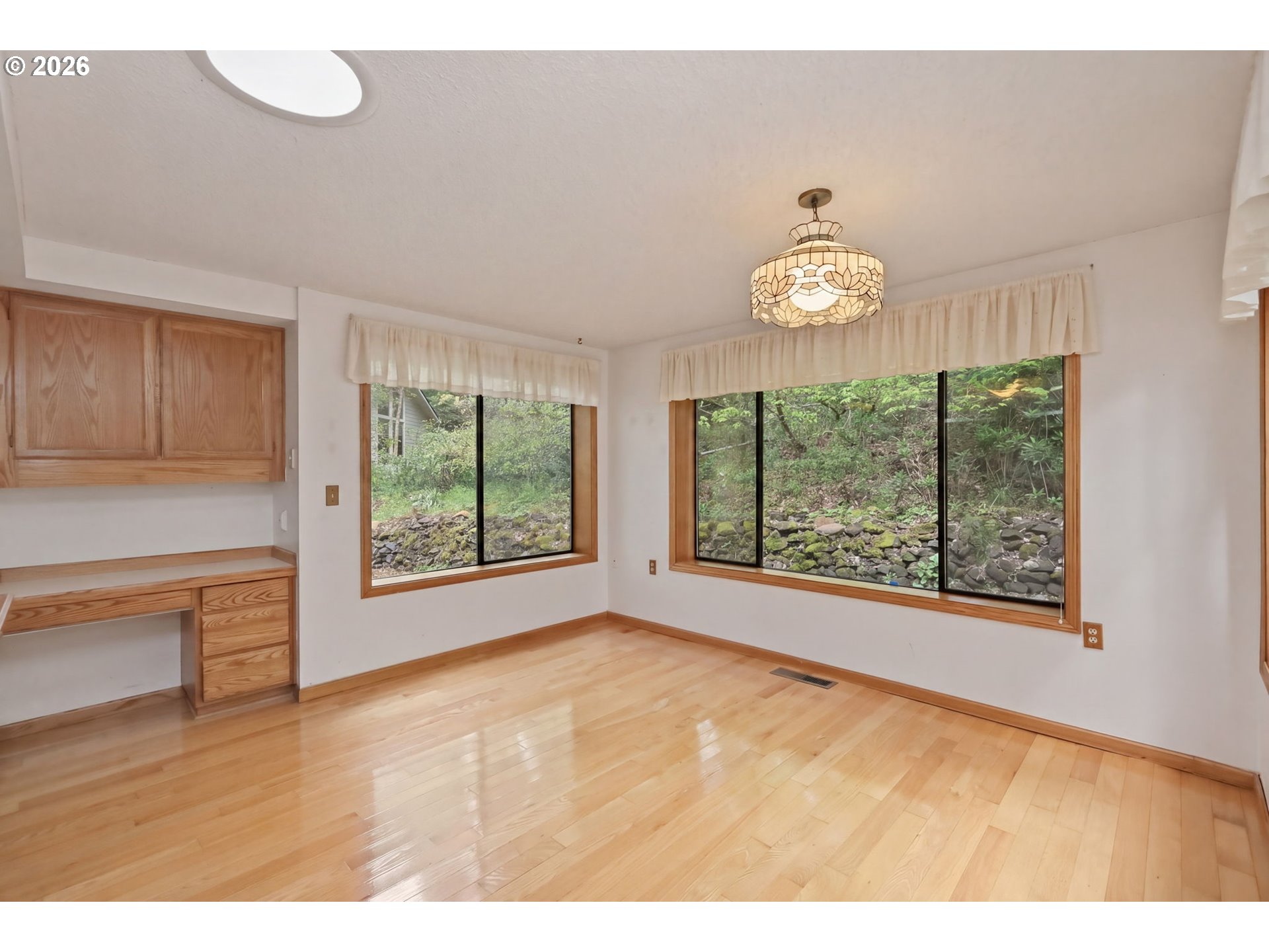 2983 Timberline Drive Eugene, OR 97405 - Photo 13 of 31 a view of an empty room with a window