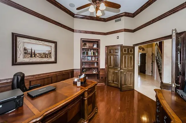 a room with lots of wooden furniture