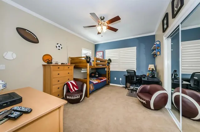 a bedroom with furniture and a bed