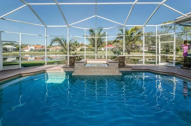 a room with lots of table and chairs