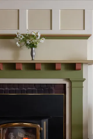 a backyard of a house with lots of green space and fountain