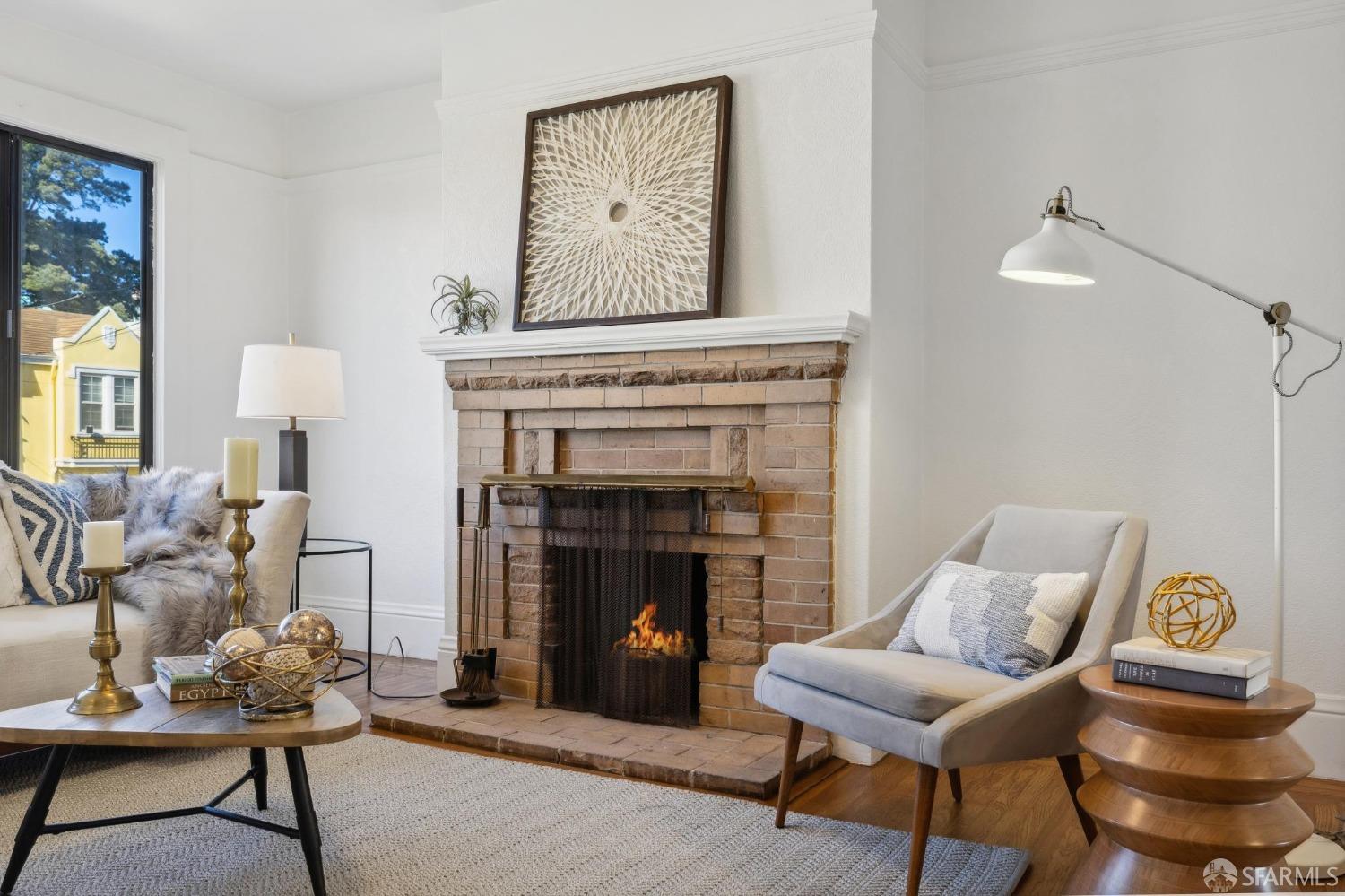 686 29th Avenue San Francisco, CA 94121 - Photo 14 of 69 a living room with furniture and a fireplace