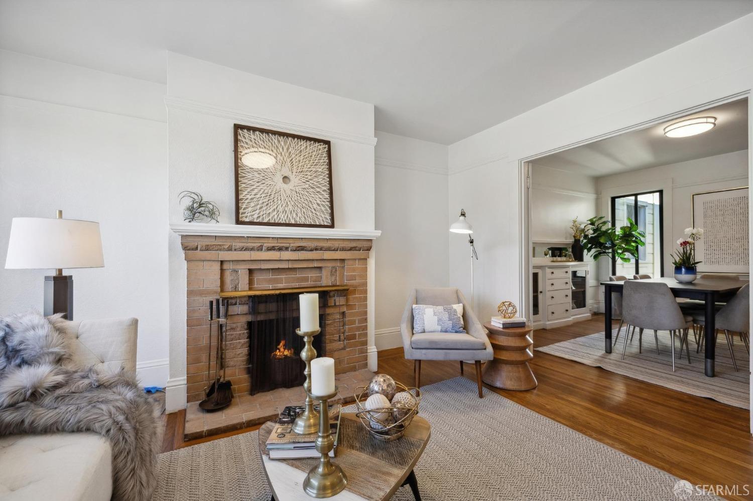 686 29th Avenue San Francisco, CA 94121 - Photo 20 of 69 a living room with furniture and a fireplace
