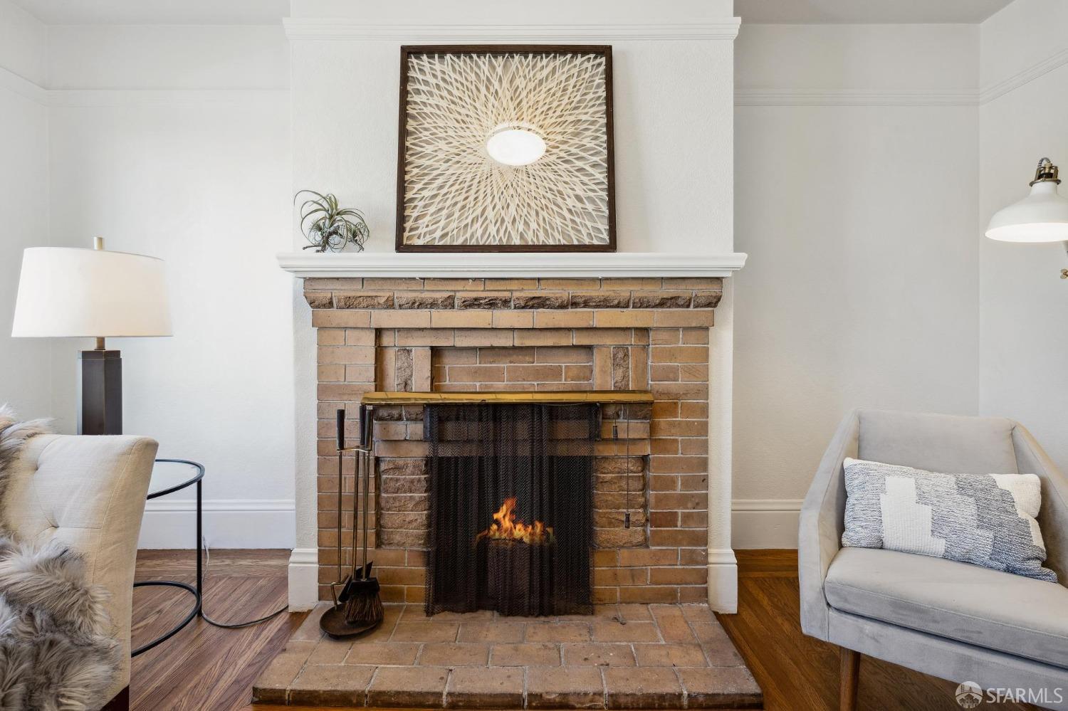 686 29th Avenue San Francisco, CA 94121 - Photo 22 of 69 a living room with furniture and a fireplace