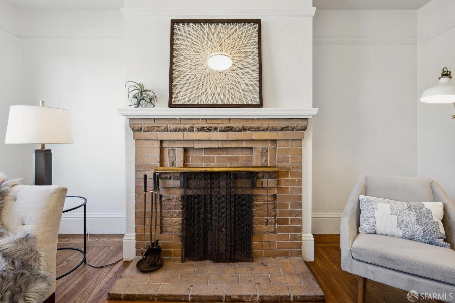 686 29th Avenue San Francisco, CA 94121 - Photo 23 of 69 a living room with furniture and a fireplace