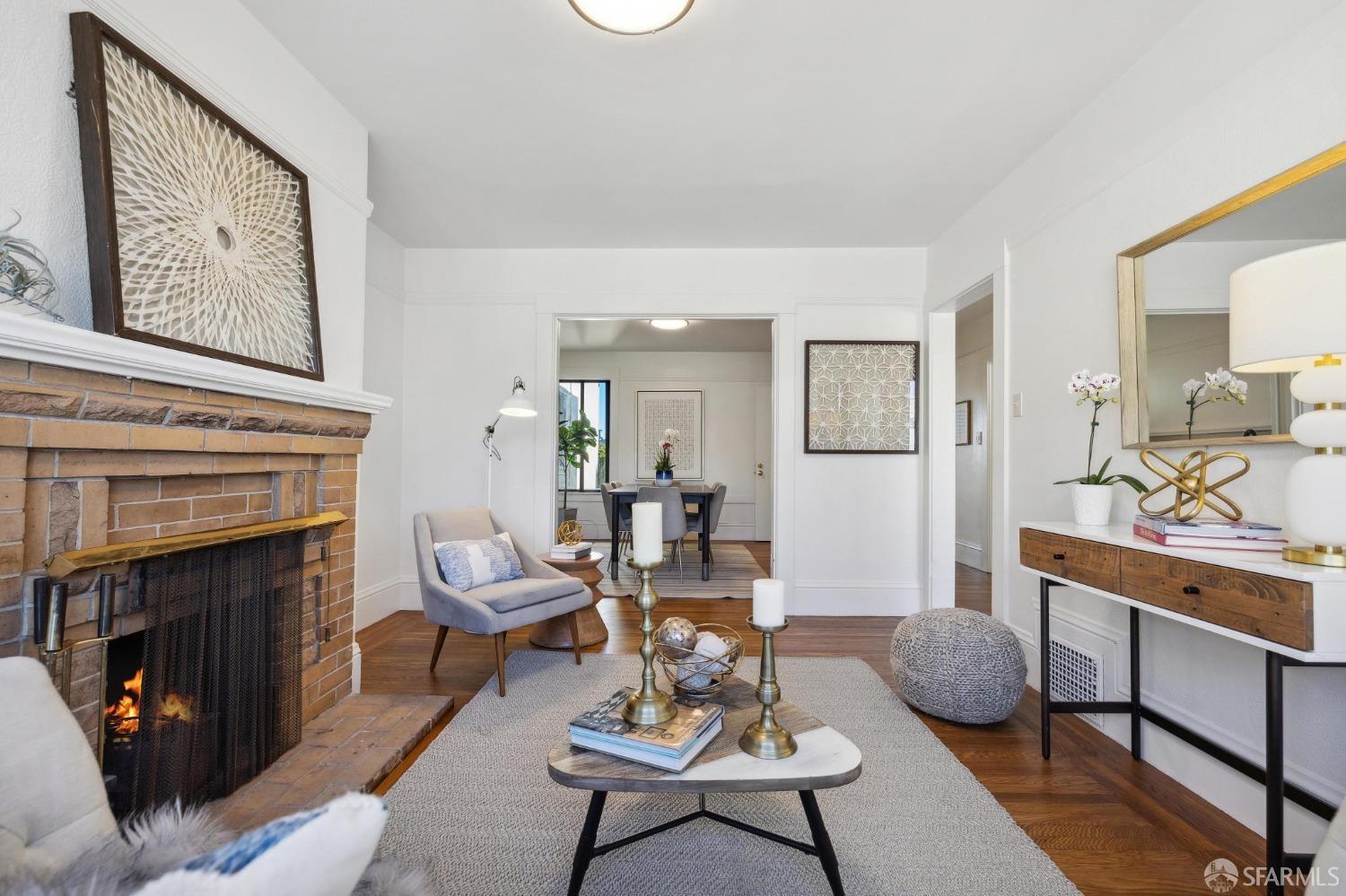 686 29th Avenue San Francisco, CA 94121 - Photo 24 of 69 a living room with furniture and a fireplace