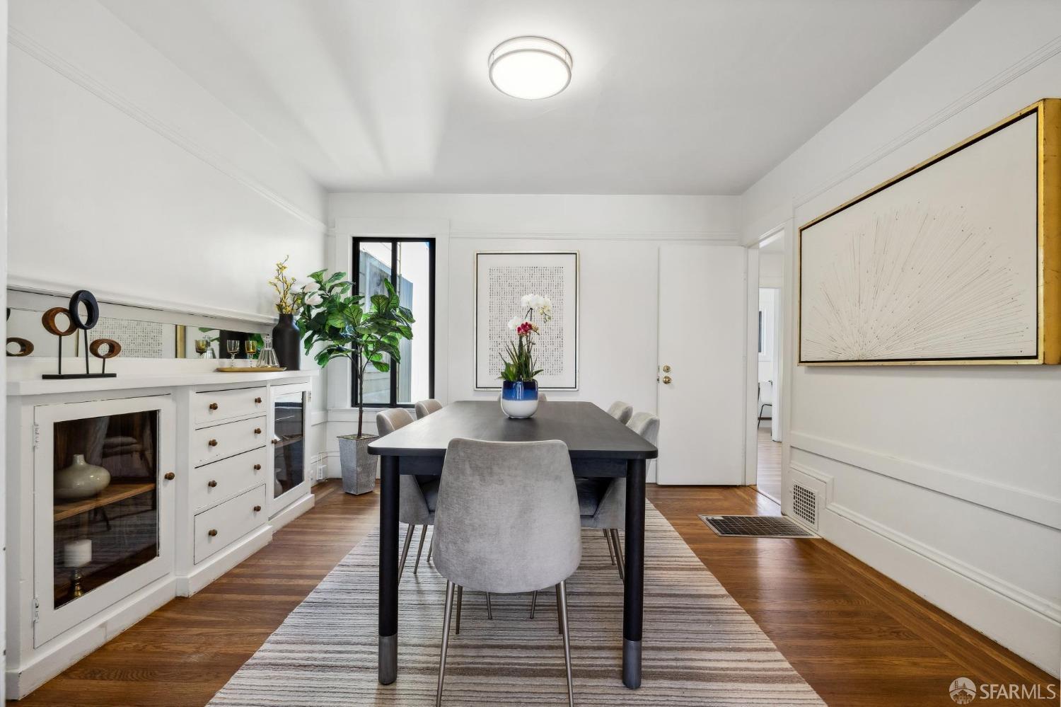 686 29th Avenue San Francisco, CA 94121 - Photo 30 of 69 a dining room with furniture and wooden floor