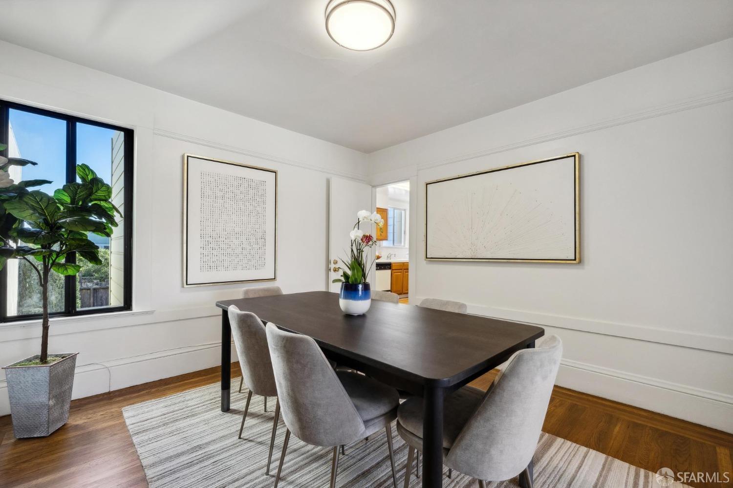 686 29th Avenue San Francisco, CA 94121 - Photo 33 of 69 a view of a dining room with furniture window and wooden floor