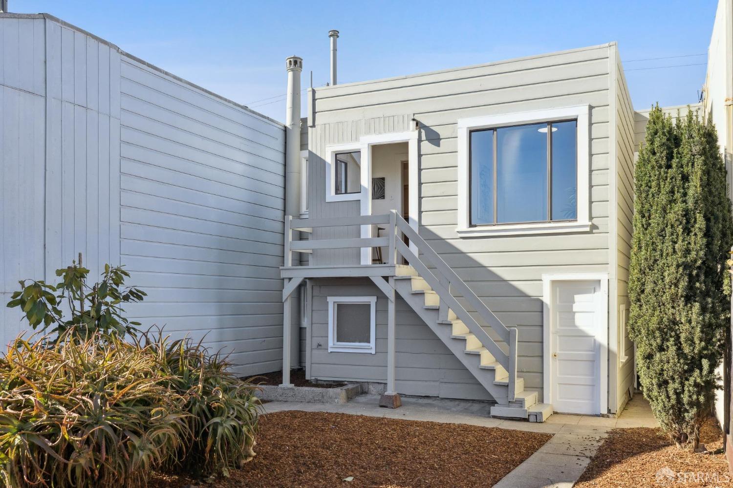 686 29th Avenue San Francisco, CA 94121 - Photo 63 of 69 a view of a house with a yard