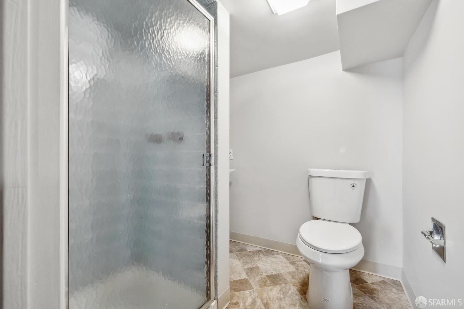 686 29th Avenue San Francisco, CA 94121 - Photo 68 of 69 a bathroom with a toilet and a shower