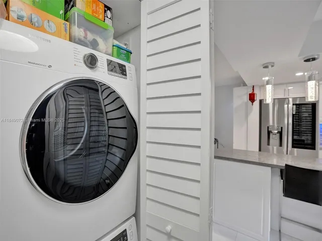 a utility room with a washer and dryer