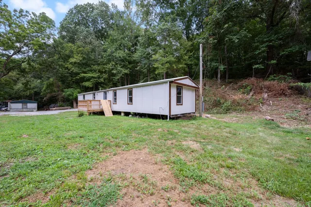 a view of a backyard with a garden