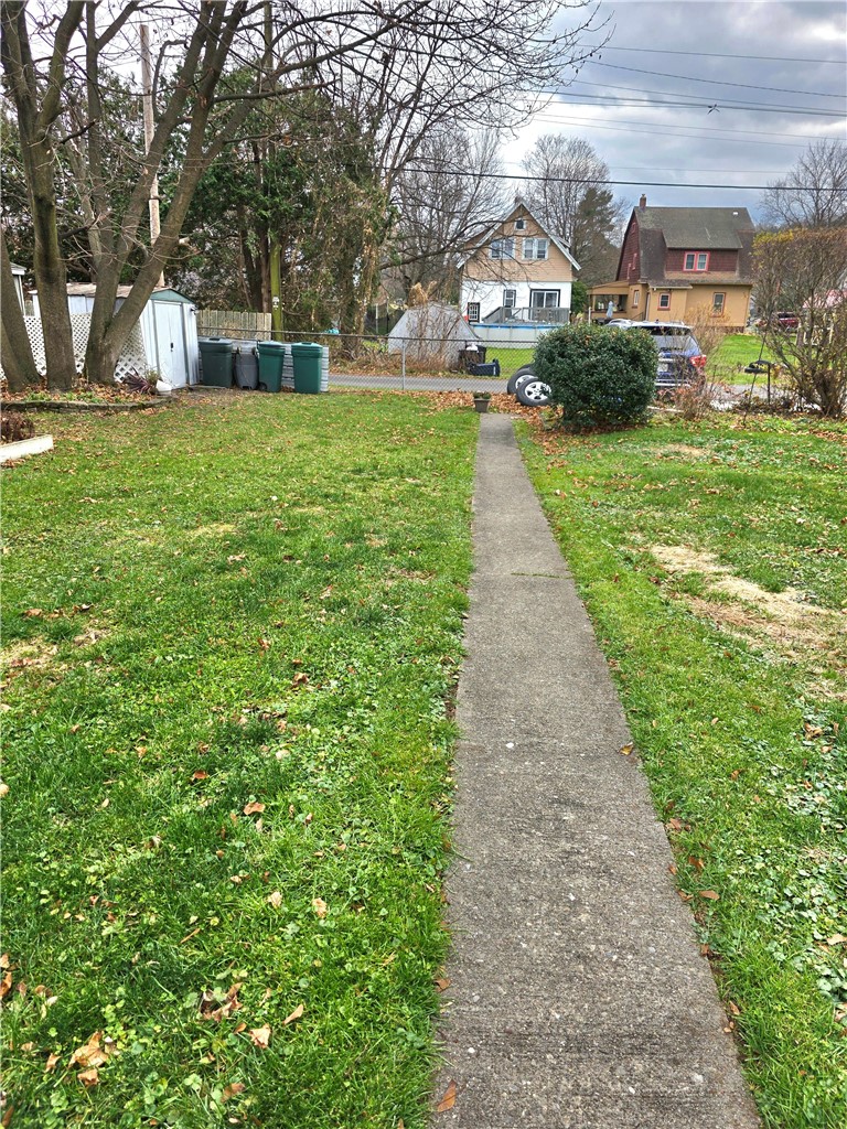 422 Watauga Avenue Corning, NY 14830 - Photo 45 of 49 Sidewalk from house to parking area