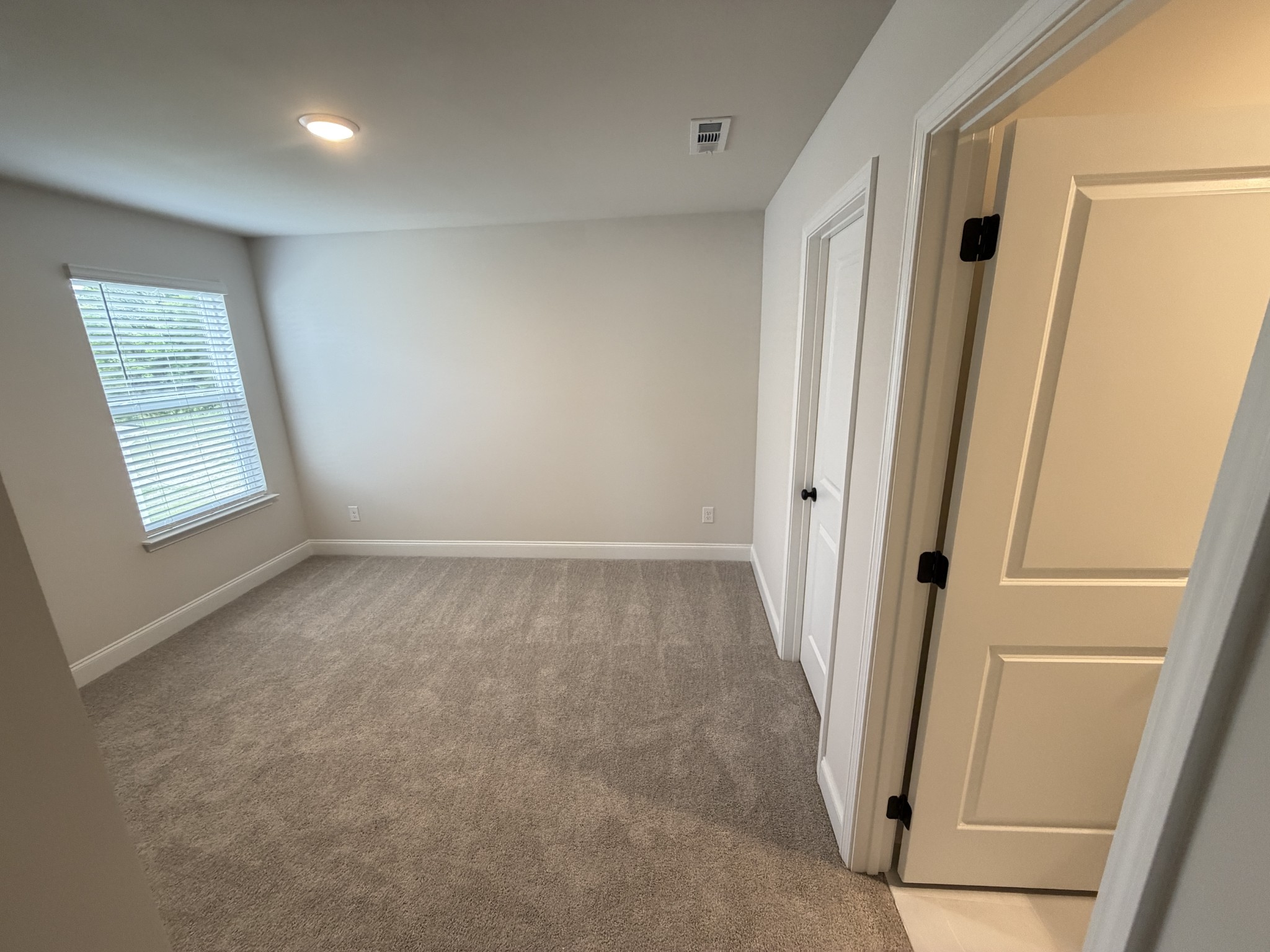 147 Emeline Way Mount Juliet, TN 37122 - Photo 29 of 41 an empty room with windows