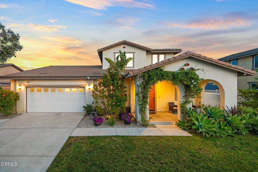 a front view of house with yard