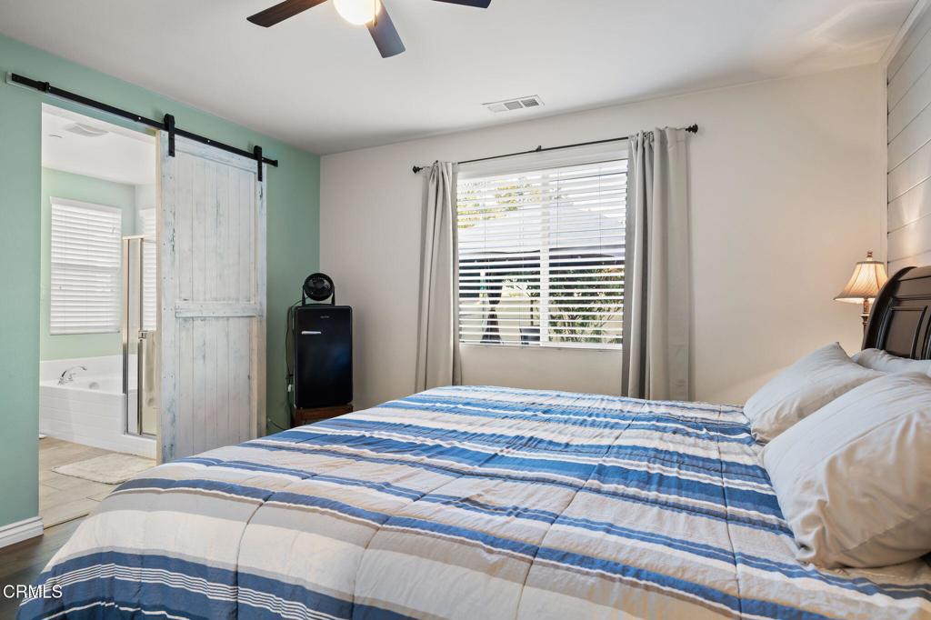 396 Edgewood Drive Fillmore, CA 93015 - Photo 12 of 37 a bedroom with a bed and a window