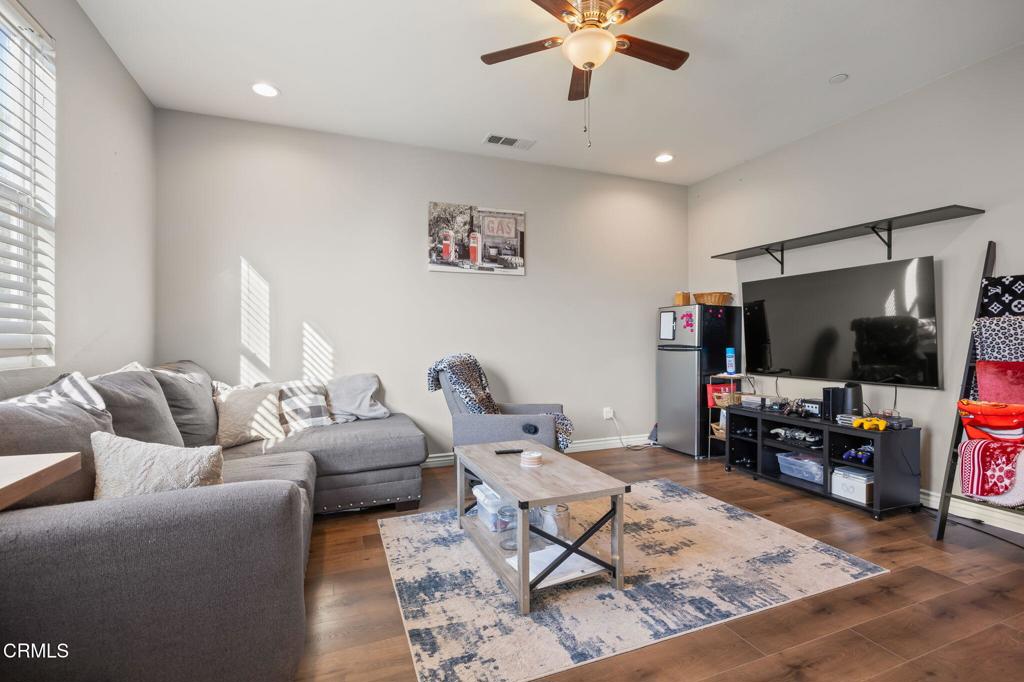 396 Edgewood Drive Fillmore, CA 93015 - Photo 16 of 37 a living room with furniture and a flat screen tv
