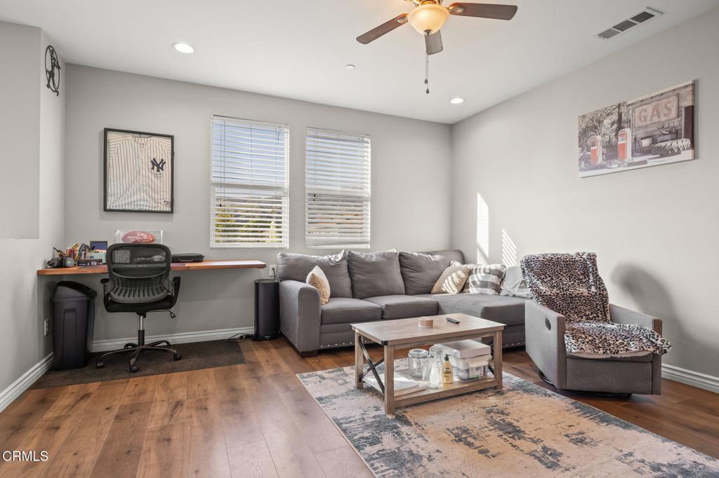 396 Edgewood Drive Fillmore, CA 93015 - Photo 17 of 37 a living room with furniture and a window