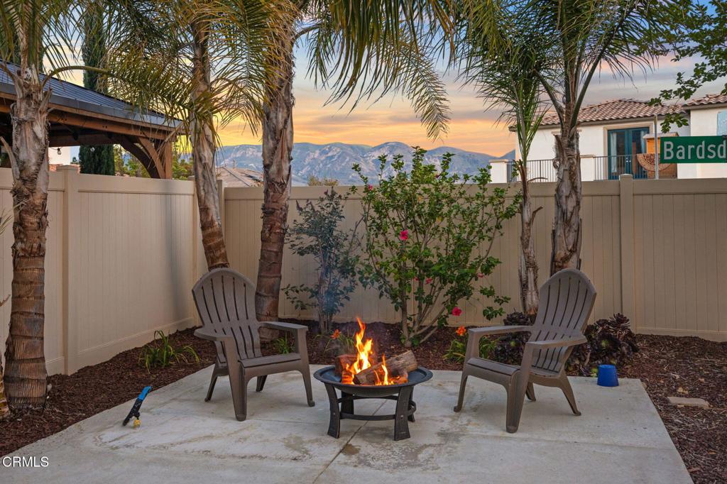 396 Edgewood Drive Fillmore, CA 93015 - Photo 28 of 37 a view of a backyard with a patio and a fire pit