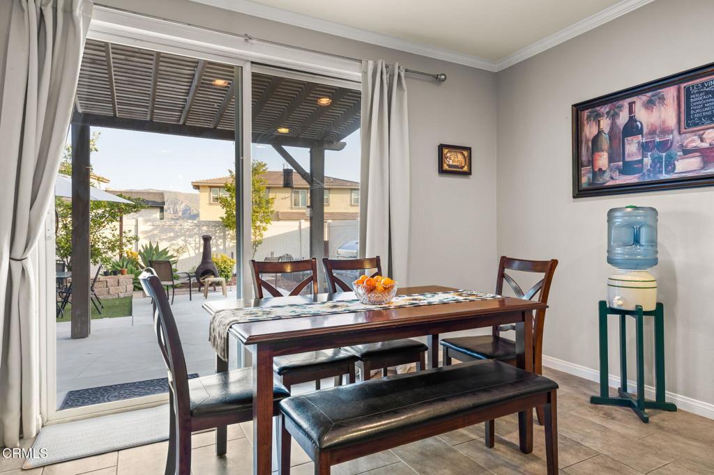 396 Edgewood Drive Fillmore, CA 93015 - Photo 10 of 37 a view of a dining room with furniture window and outside view