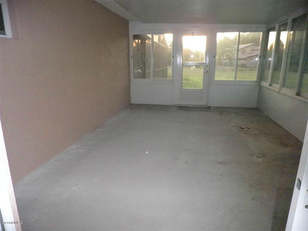 321 North Range Road Cocoa, FL 32926 - Photo 18 of 20 Side Screened Porch