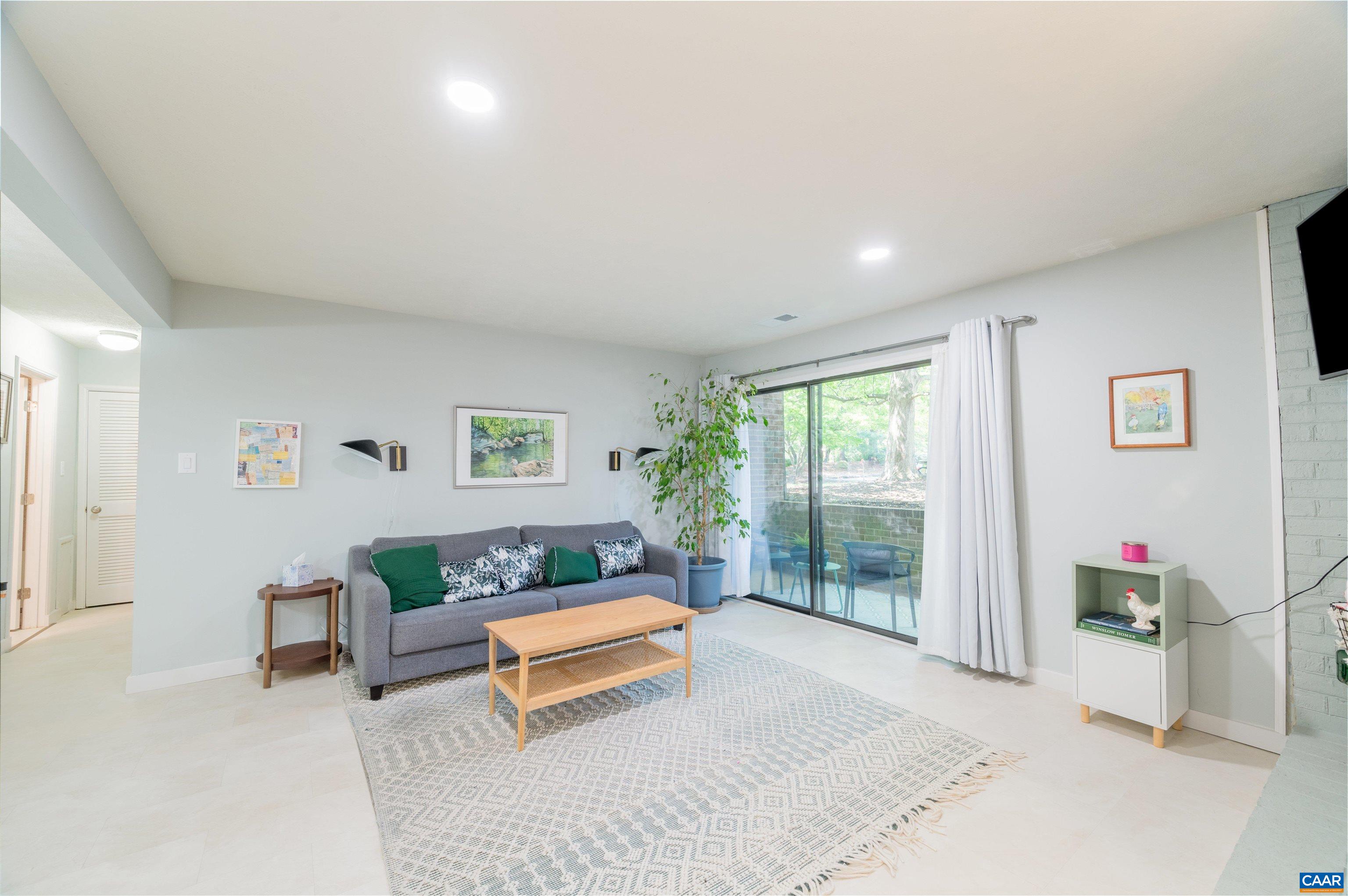 134 Turtle Creek Road, Unit 4 Charlottesville, VA 22901 - Photo 11 of 19 a living room with furniture and a window