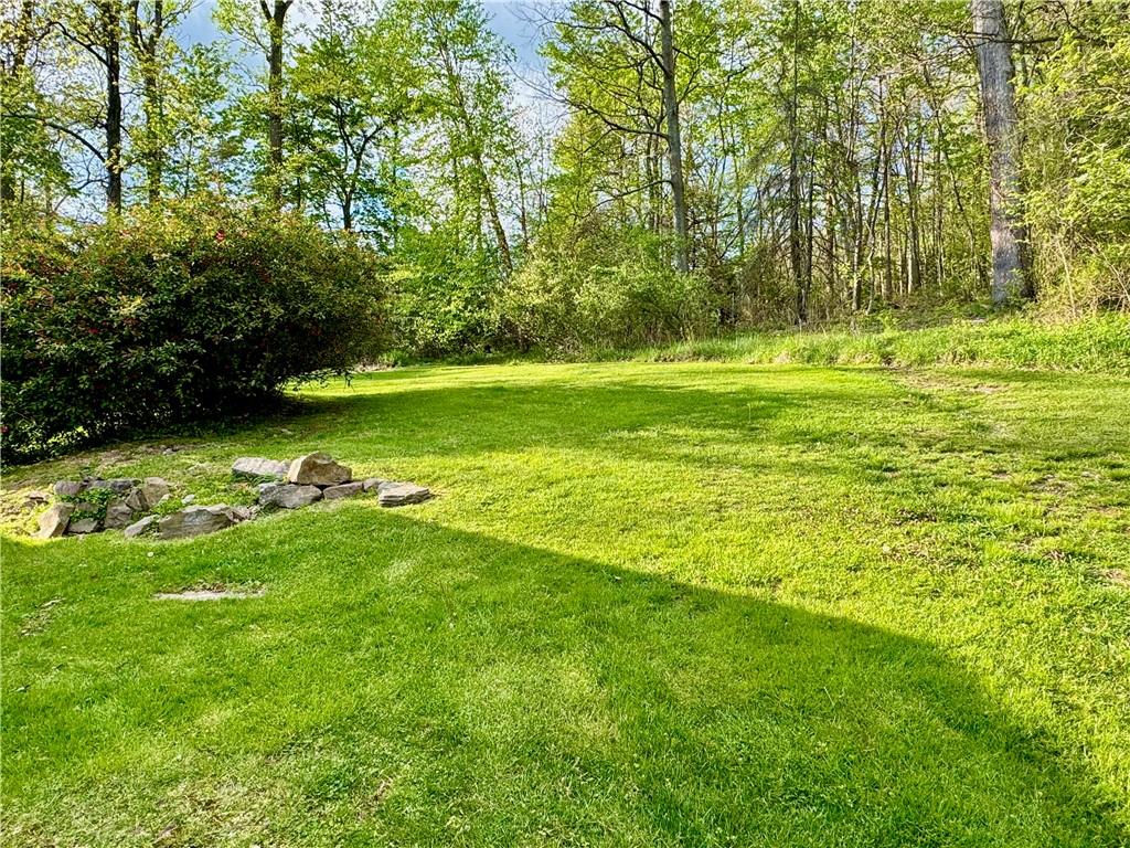504 Sawmill Road Greensburg, PA 15601 - Photo 16 of 25 The yard is private and has space for everything you may want to do outside, gardening, or any outdoor activity you can think of.