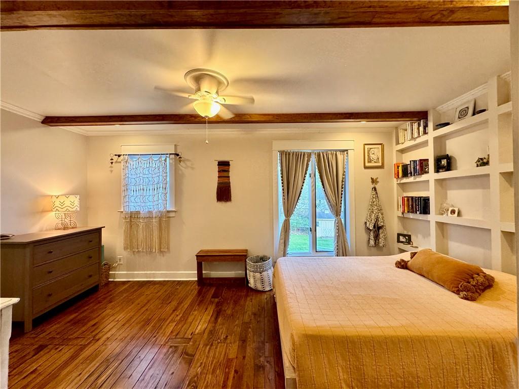 504 Sawmill Road Greensburg, PA 15601 - Photo 10 of 25 The beams are warm and the built in shelves provide beauty and function.