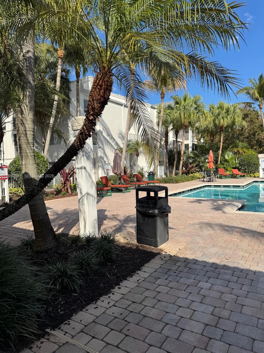 5760 Rock Island Road, Unit 304 Tamarac, FL 33319 - Photo 32 of 40 a view of water with palm trees