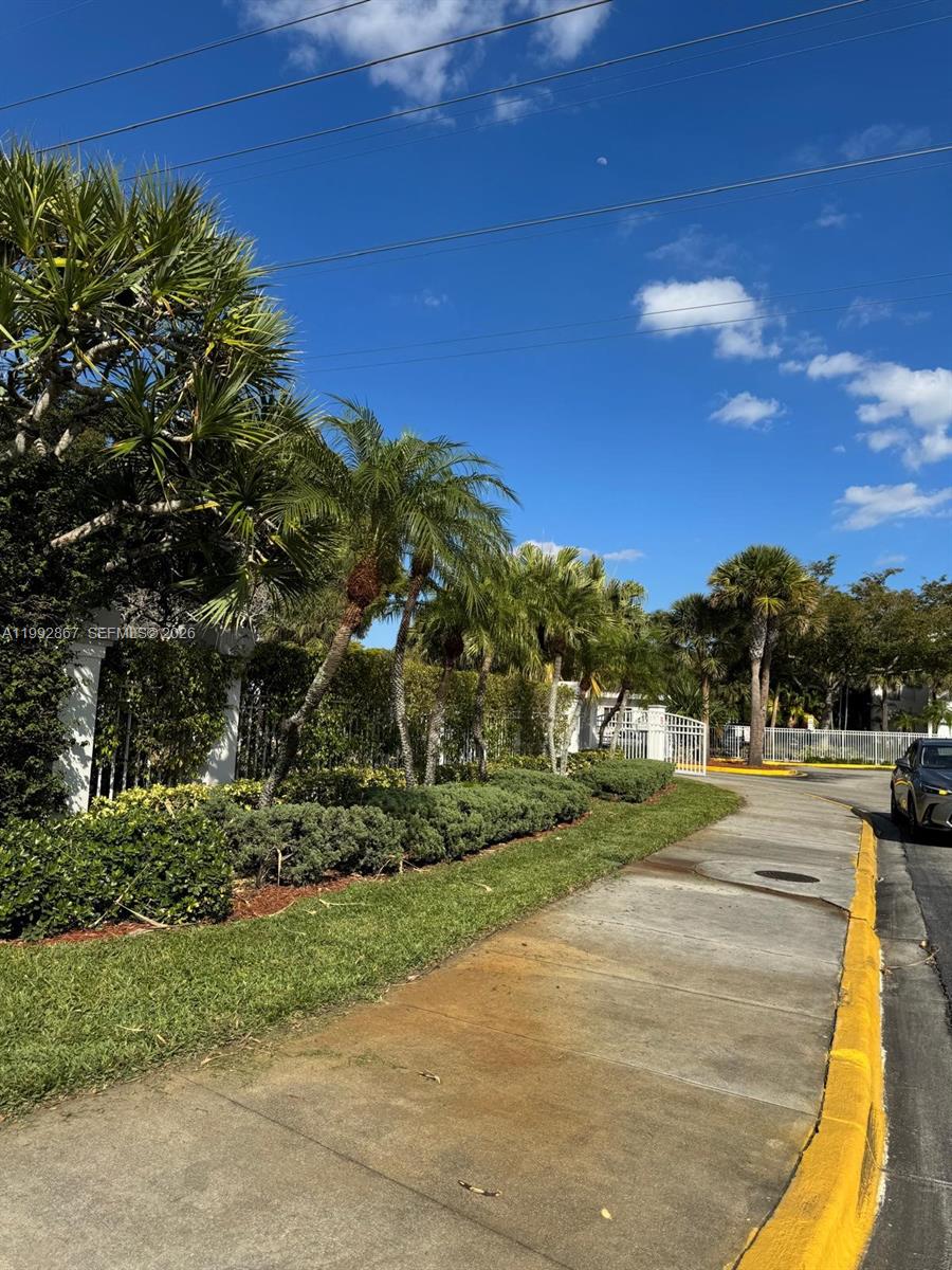 5760 Rock Island Road, Unit 304 Tamarac, FL 33319 - Photo 35 of 40 a view of an outdoor space and yard