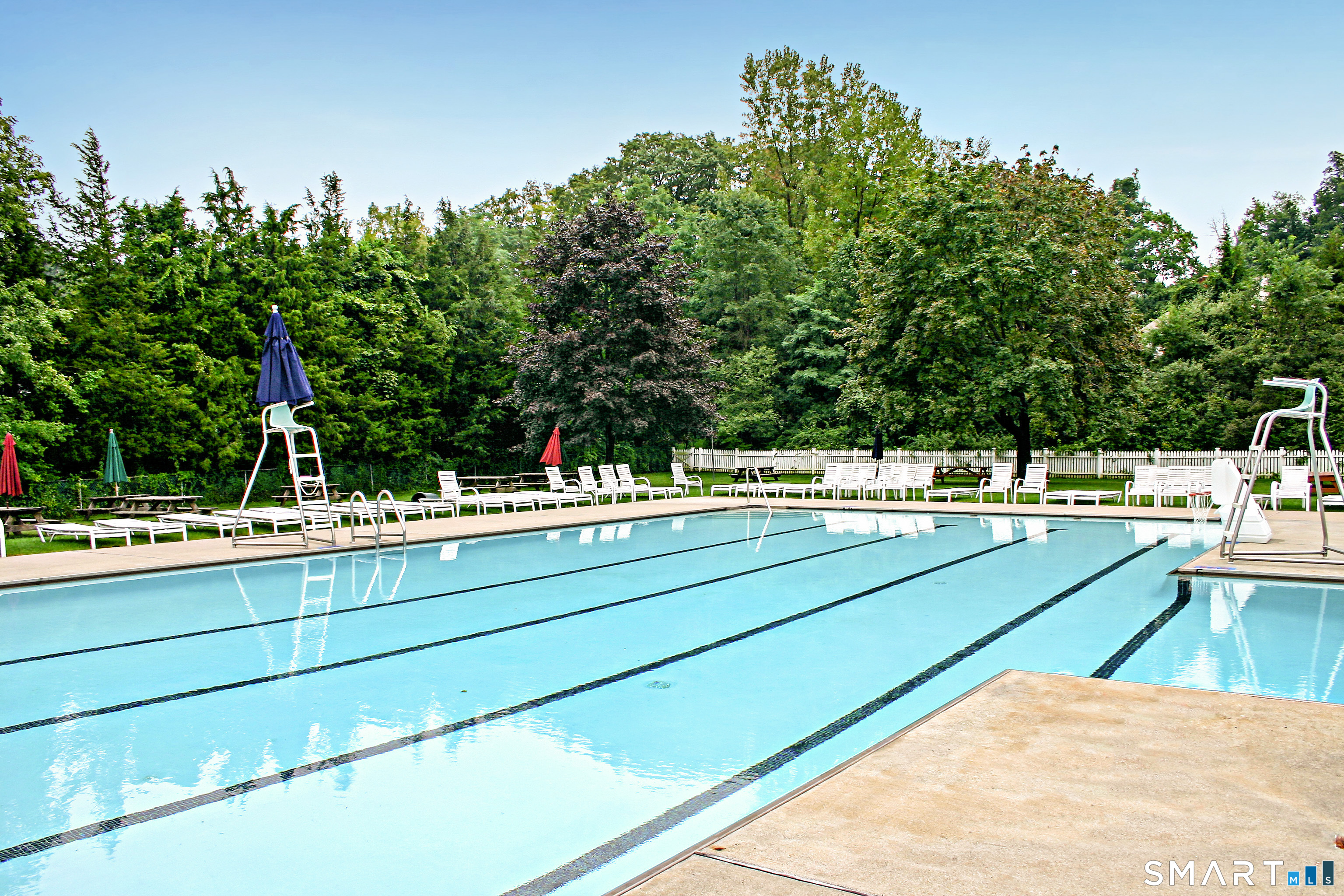 15 Schoolhouse Place Ridgefield, CT 06877 - Photo 28 of 39 a view of swimming pool with chairs