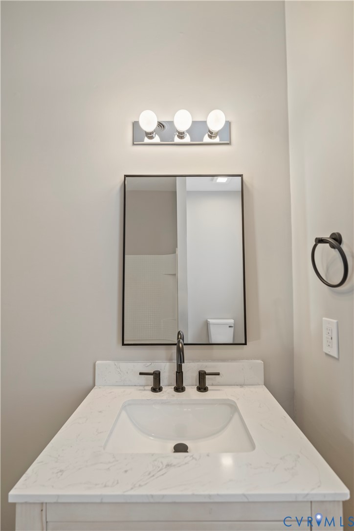 22 Corling Street Petersburg, VA 23803 - Photo 13 of 16 Bathroom with vanity and toilet
