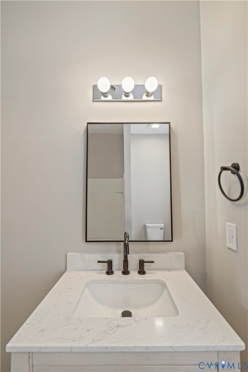 22 Corling Street Petersburg, VA 23803 - Photo 13 of 16 a bathroom with a sink and a mirror