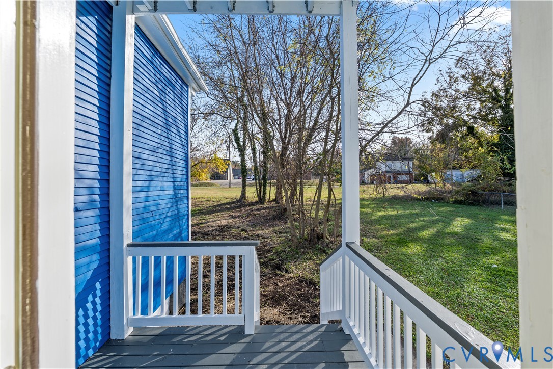 22 Corling Street Petersburg, VA 23803 - Photo 15 of 16 Wooden terrace with a lawn