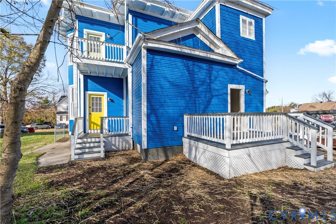 22 Corling Street Petersburg, VA 23803 - Photo 16 of 16 Back of house featuring a balcony