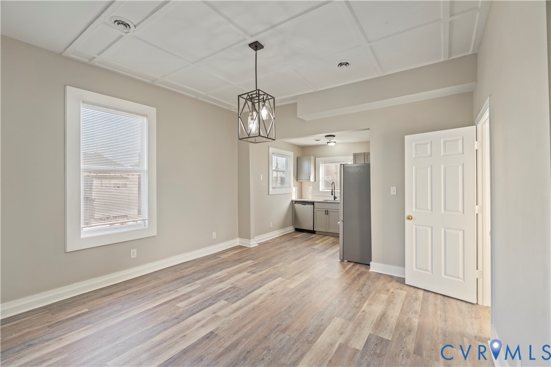 22 Corling Street Petersburg, VA 23803 - Photo 7 of 16 Unfurnished dining area with light wood-type floor