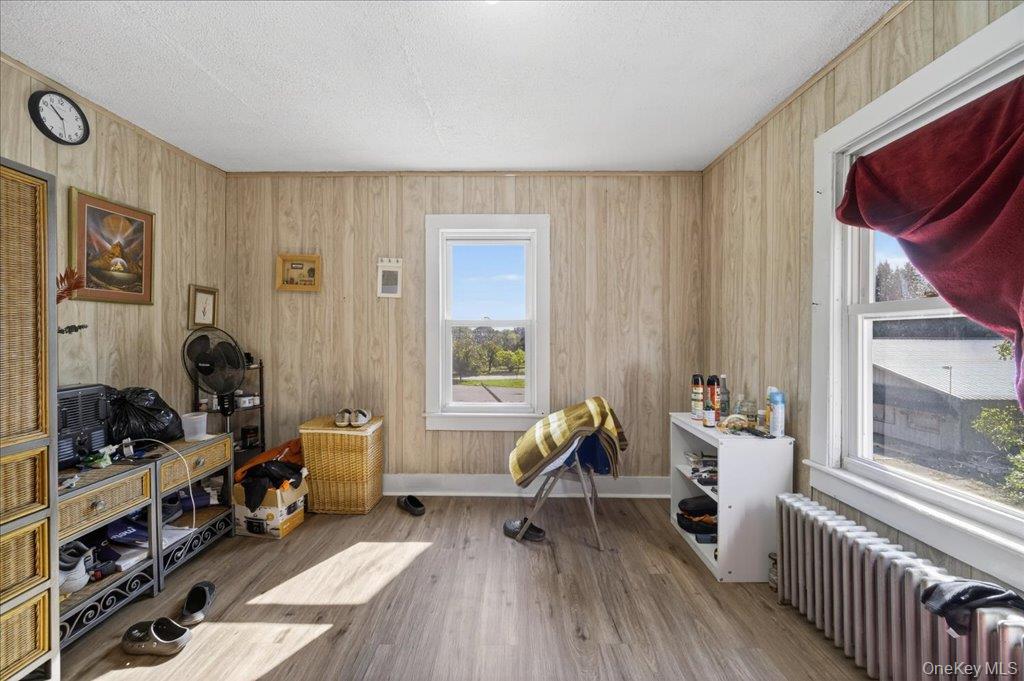 67 Main Street Bloomingburg, NY 12721 - Photo 4 of 29 a living room with furniture and a window