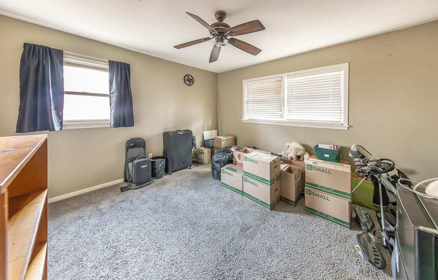 4604 31st Street Lubbock, TX 79410 - Photo 16 of 25 a living room with furniture and a window