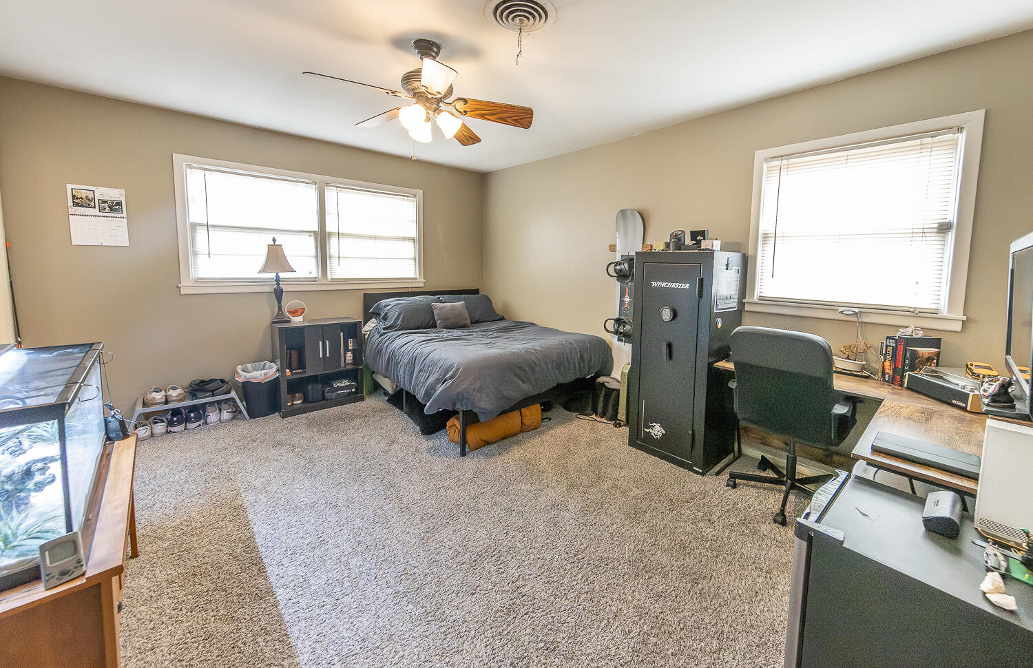 4604 31st Street Lubbock, TX 79410 - Photo 18 of 25 a bedroom with furniture and a window