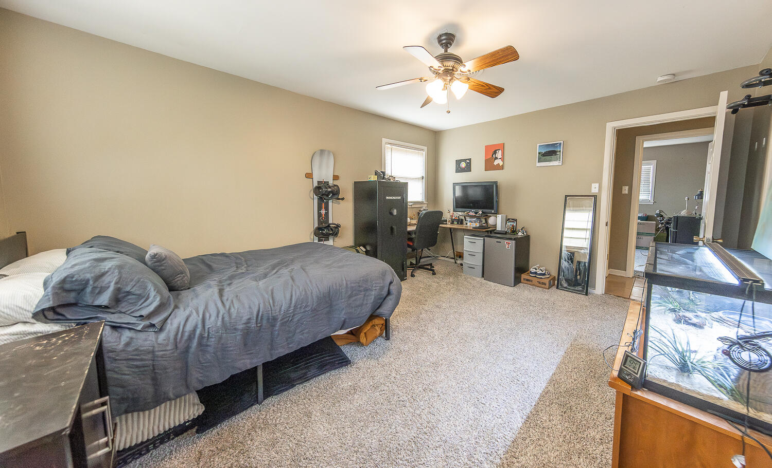 4604 31st Street Lubbock, TX 79410 - Photo 19 of 25 a living room with furniture and wooden floor