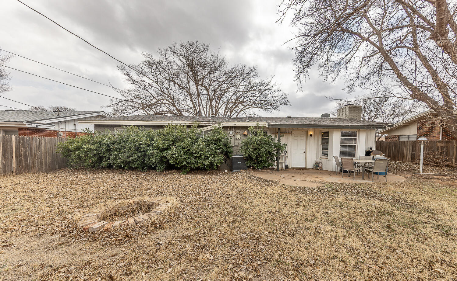 4604 31st Street Lubbock, TX 79410 - Photo 23 of 25 a front view of a house with a garden