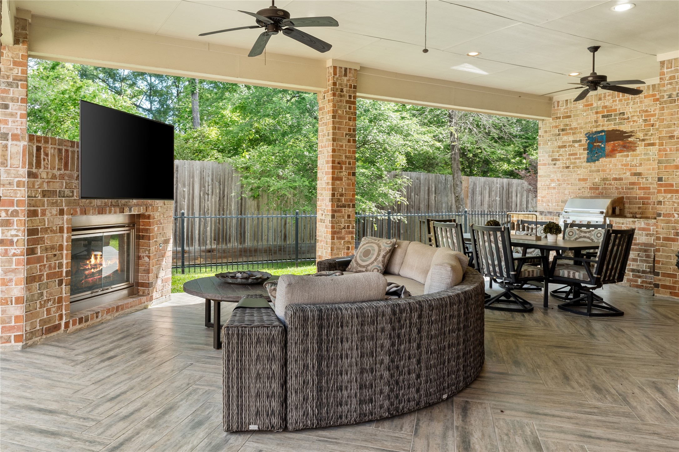 19813 Cullen Ridge Drive Porter, TX 77365 - Photo 38 of 44 This inviting outdoor space features stylish tile flooring for effortless living, perfect for relaxation and entertaining.