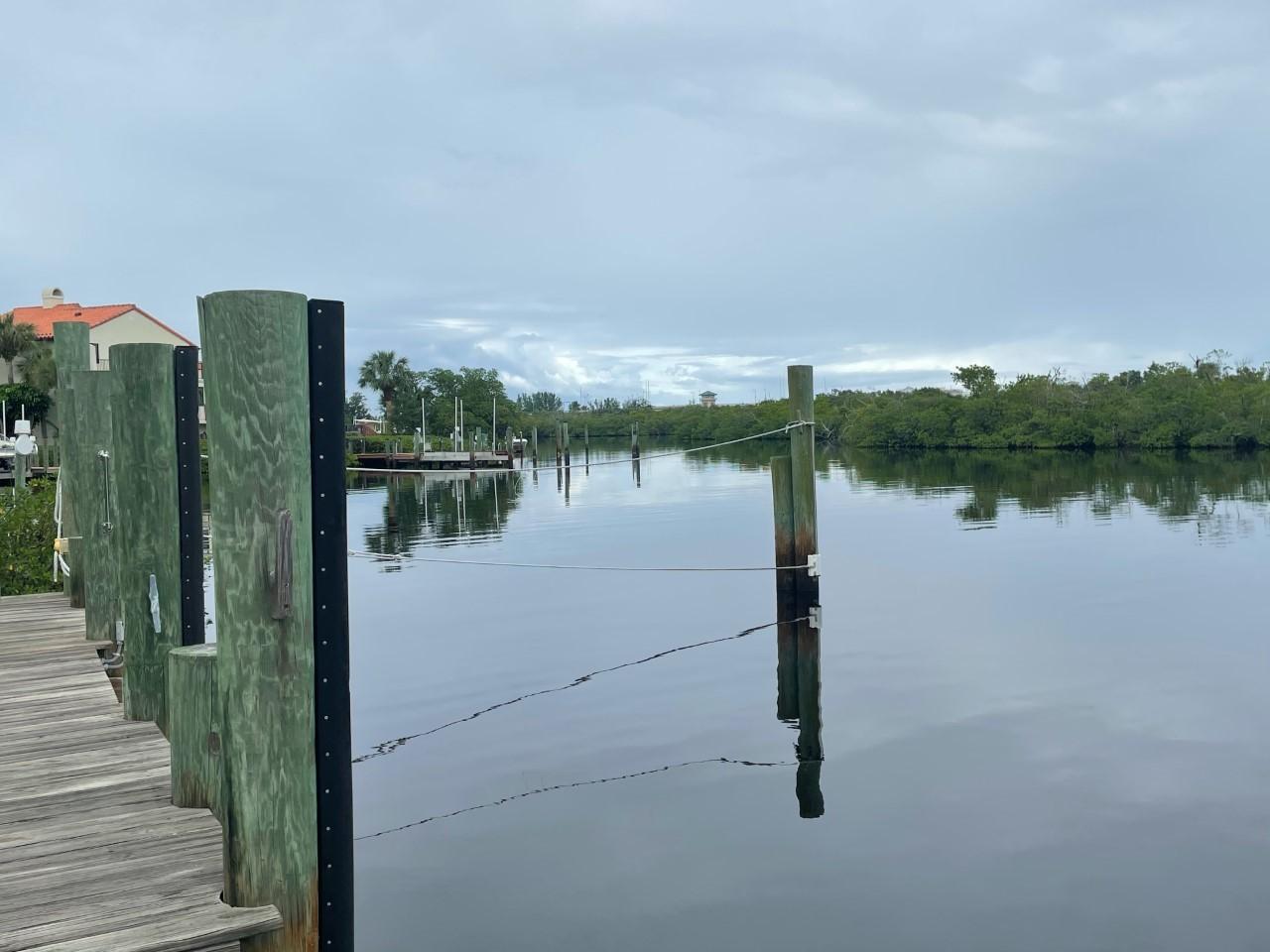 16952 Passage South Jupiter, FL 33477 - Photo 4 of 4 a view of a lake with a outdoor space