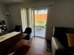 a workspace with furniture and a window