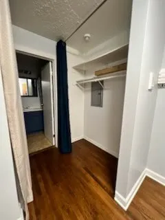 a view of entryway with wooden floor