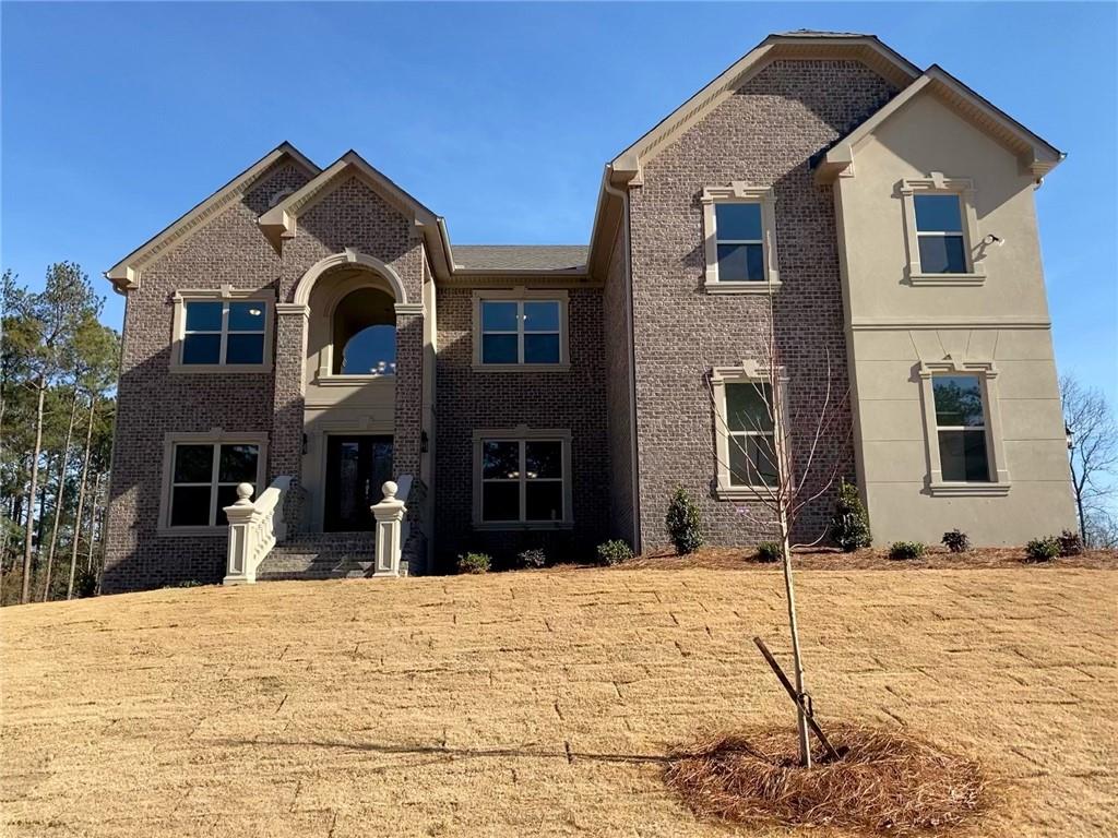 175 Basie Court Fairburn, GA 30213 - Photo 1 of 1 a front view of a house with a yard