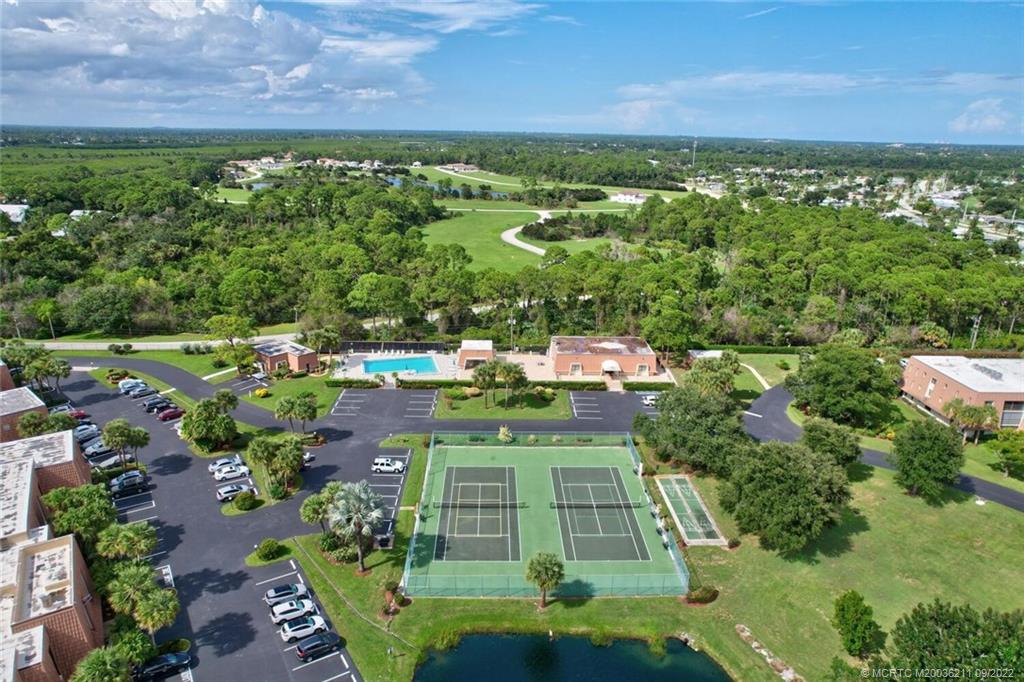 3100 Southeast Pruitt Road, Unit B102 Port St. Lucie, FL 34952 - Photo 45 of 55 a view of a lush green field