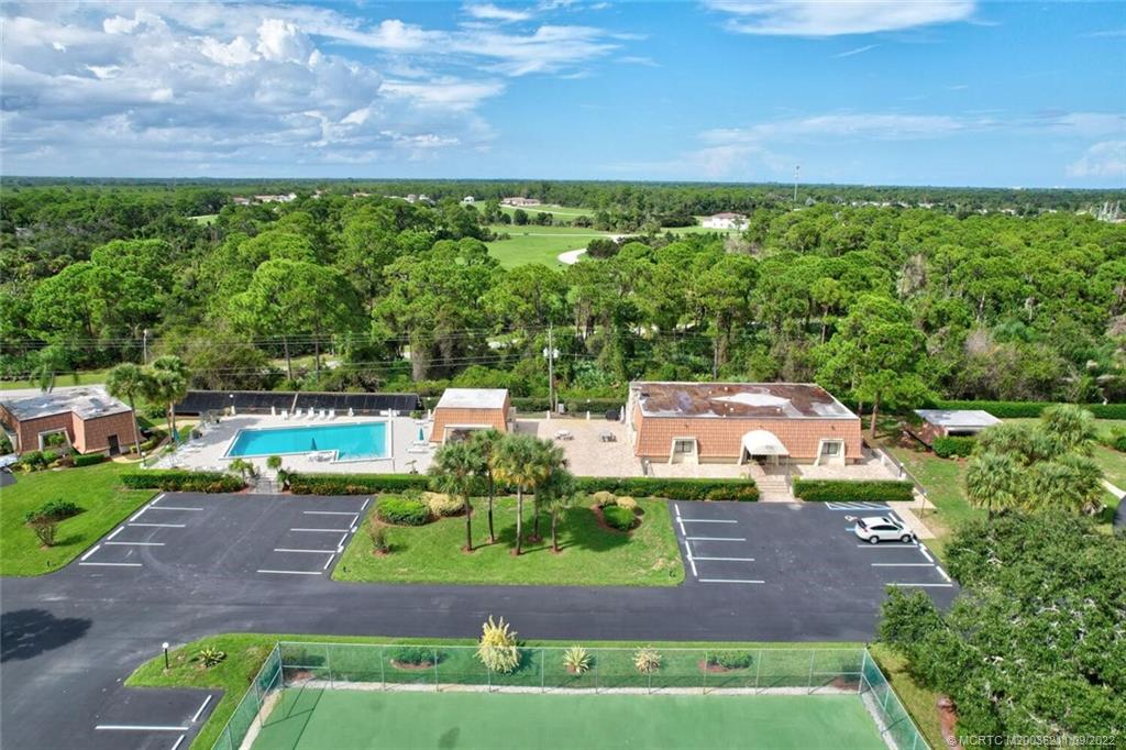 3100 Southeast Pruitt Road, Unit B102 Port St. Lucie, FL 34952 - Photo 47 of 55 a view of yard with seating area