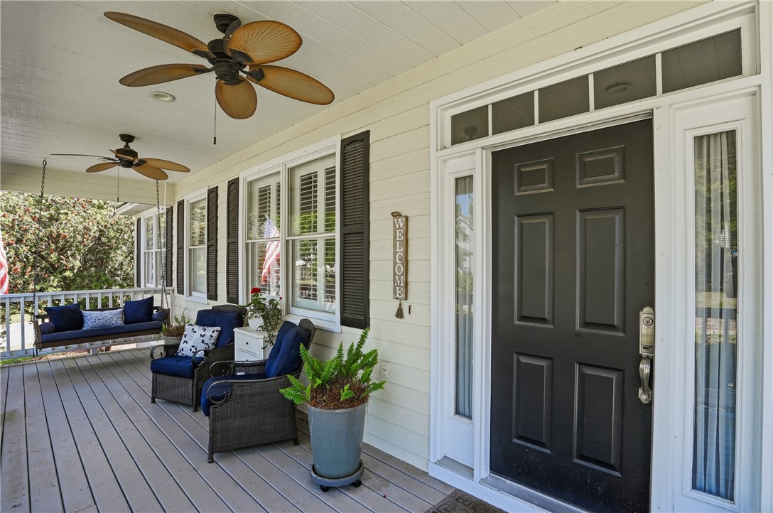 401 Colley Lane St. Simons Island, GA 31522 - Photo 3 of 27 Who Doesn't LOVE A Front Porch Swing